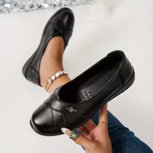 Women’s Leather-Look Slip On Shoes With Metal Emblem