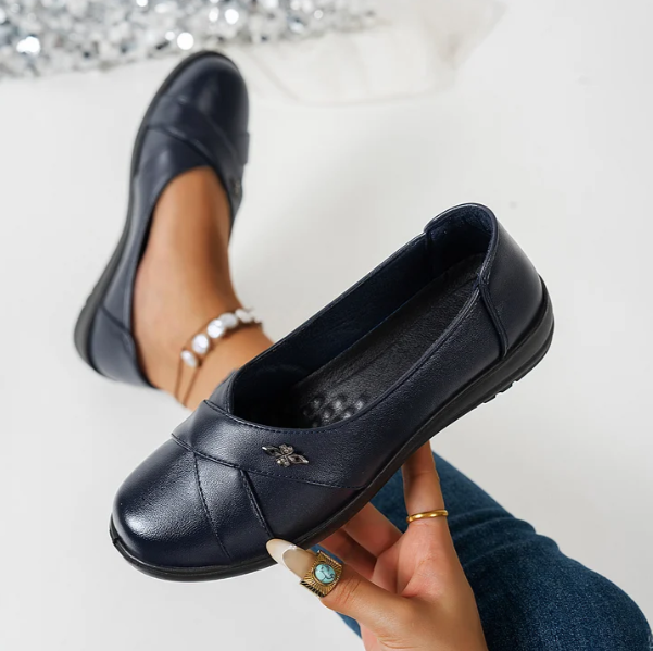 Women’s Leather-Look Slip On Shoes With Metal Emblem