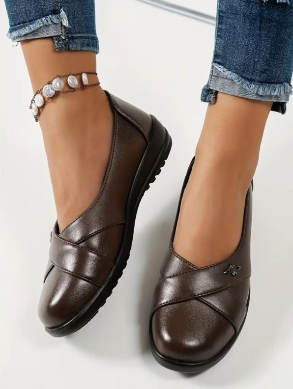 Women’s Leather-Look Slip On Shoes With Metal Emblem