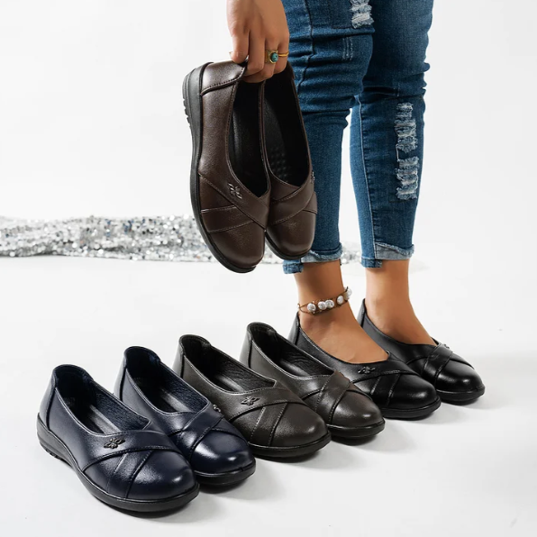 Women’s Leather-Look Slip On Shoes With Metal Emblem