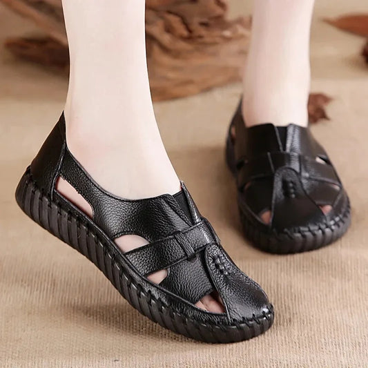 Women's flat sandals in soft natural leather-look