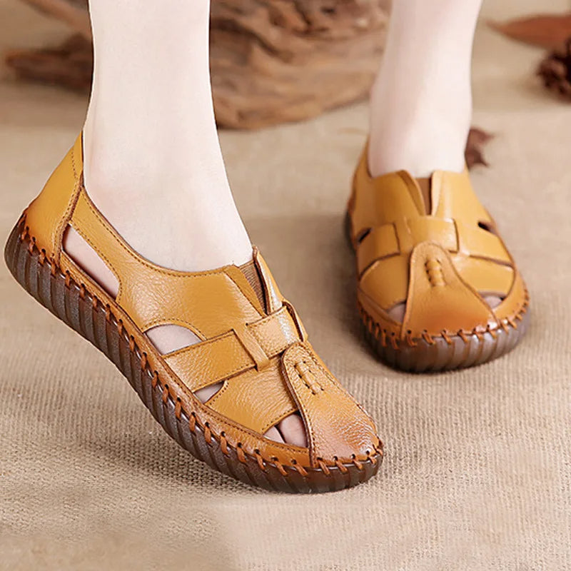 Women's flat sandals in soft natural leather-look